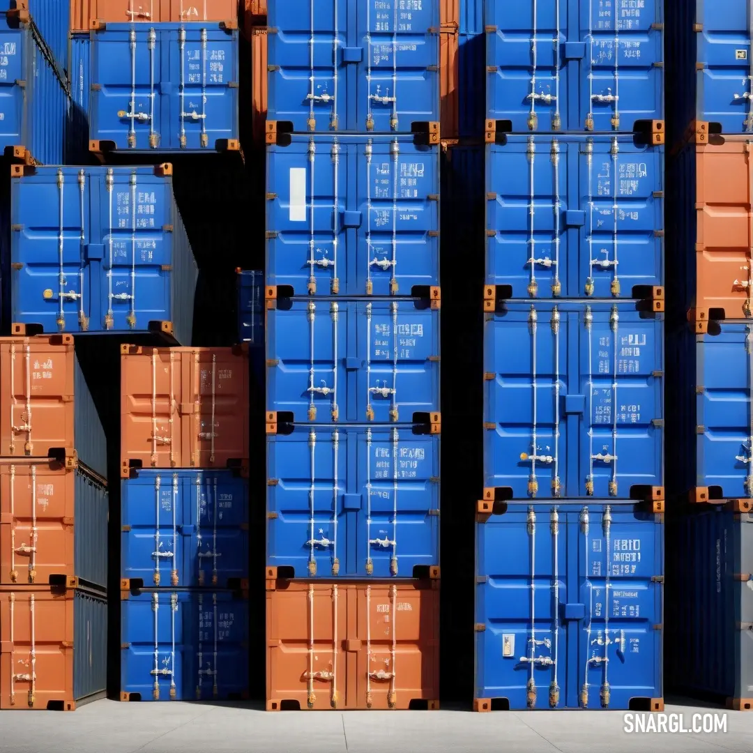 Large stack of blue and orange containers on a sidewalk in front of a building with a red door. Example of #1560BD color.