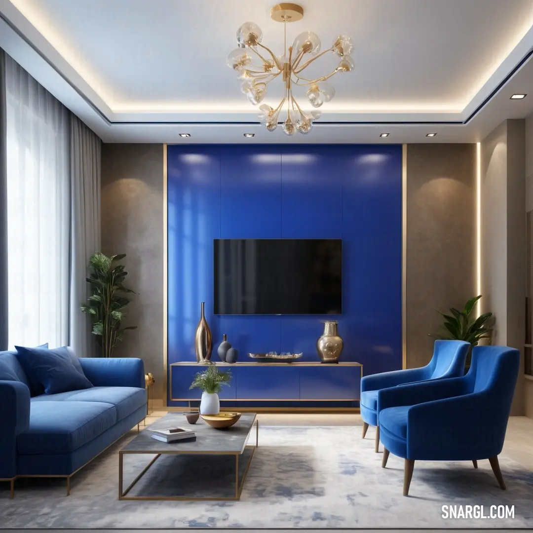 Living room with blue furniture and a large tv on a wall above a blue couch and a coffee table. Color RGB 21,96,189.