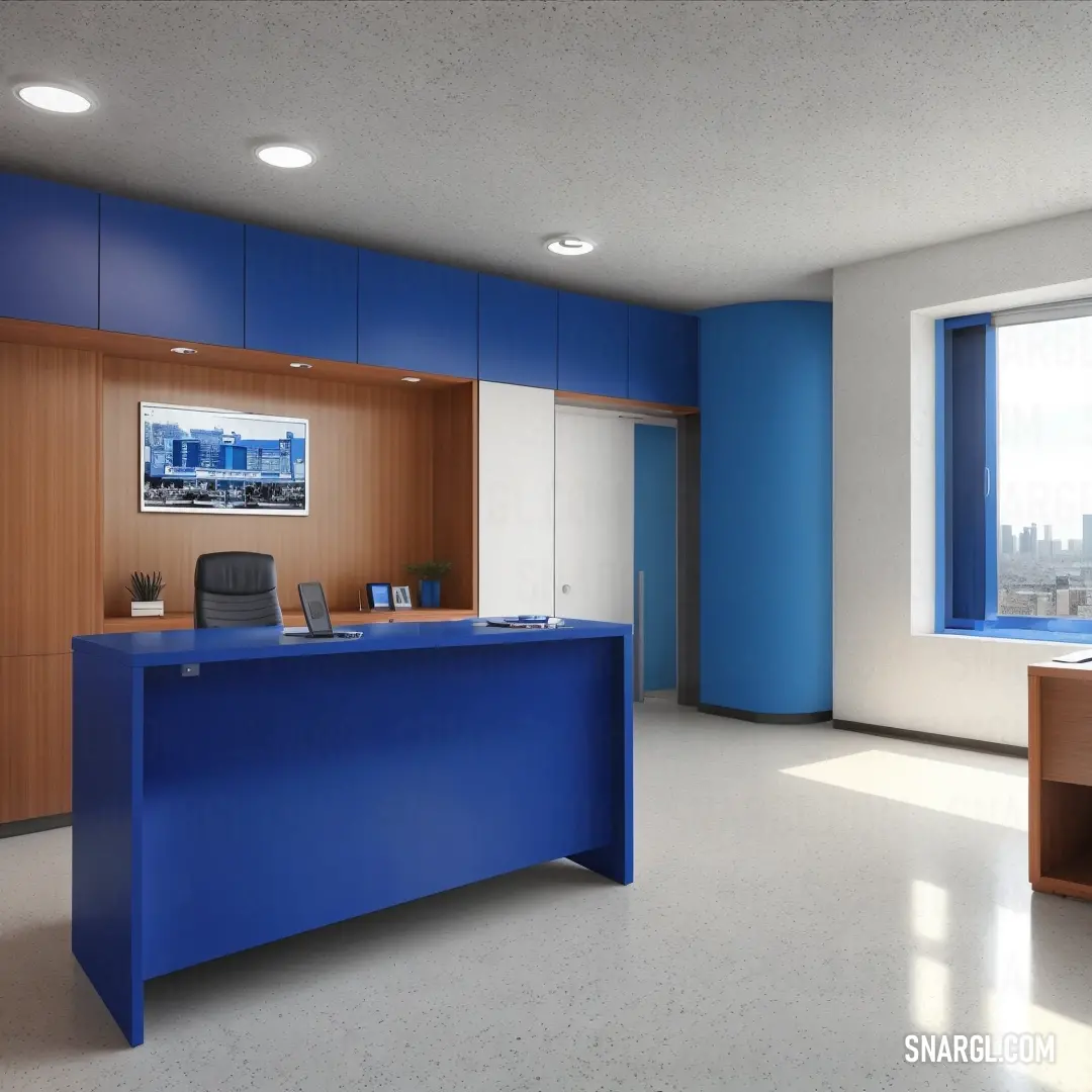 Blue desk in a large office with a window and a view of the city outside the window