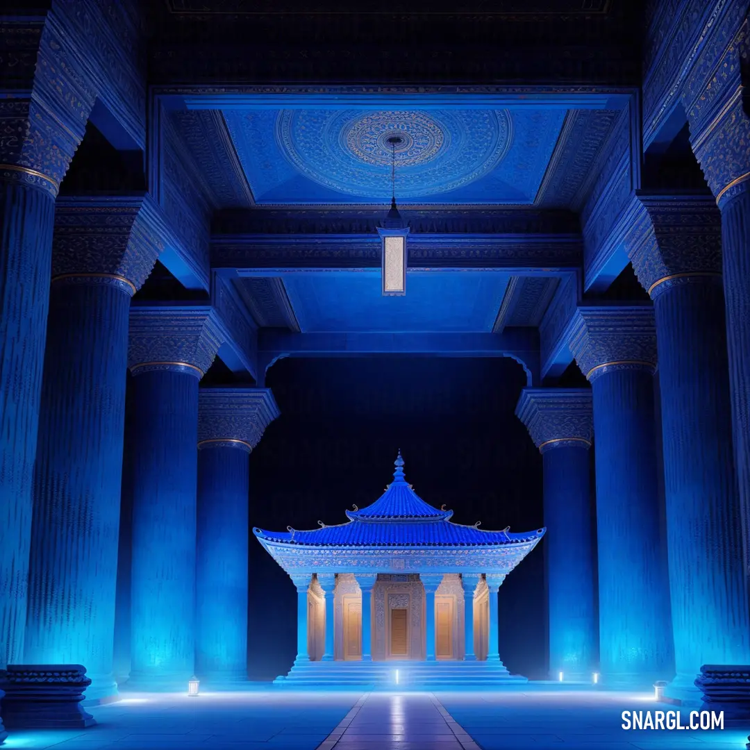 Building with columns and a blue light in the middle of it and a light at the end of the building