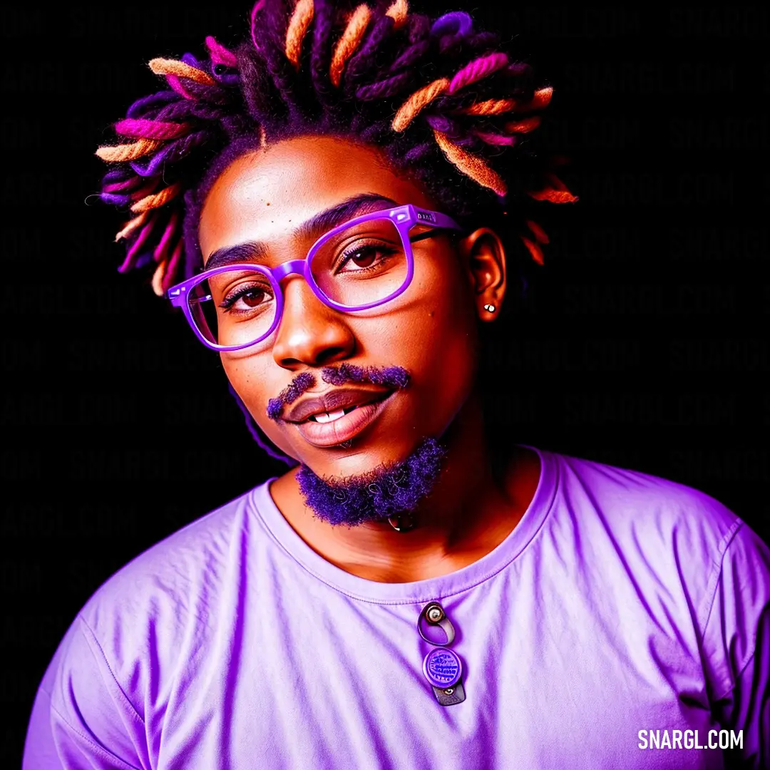 Man with glasses and a purple shirt with dreadlocks on his head