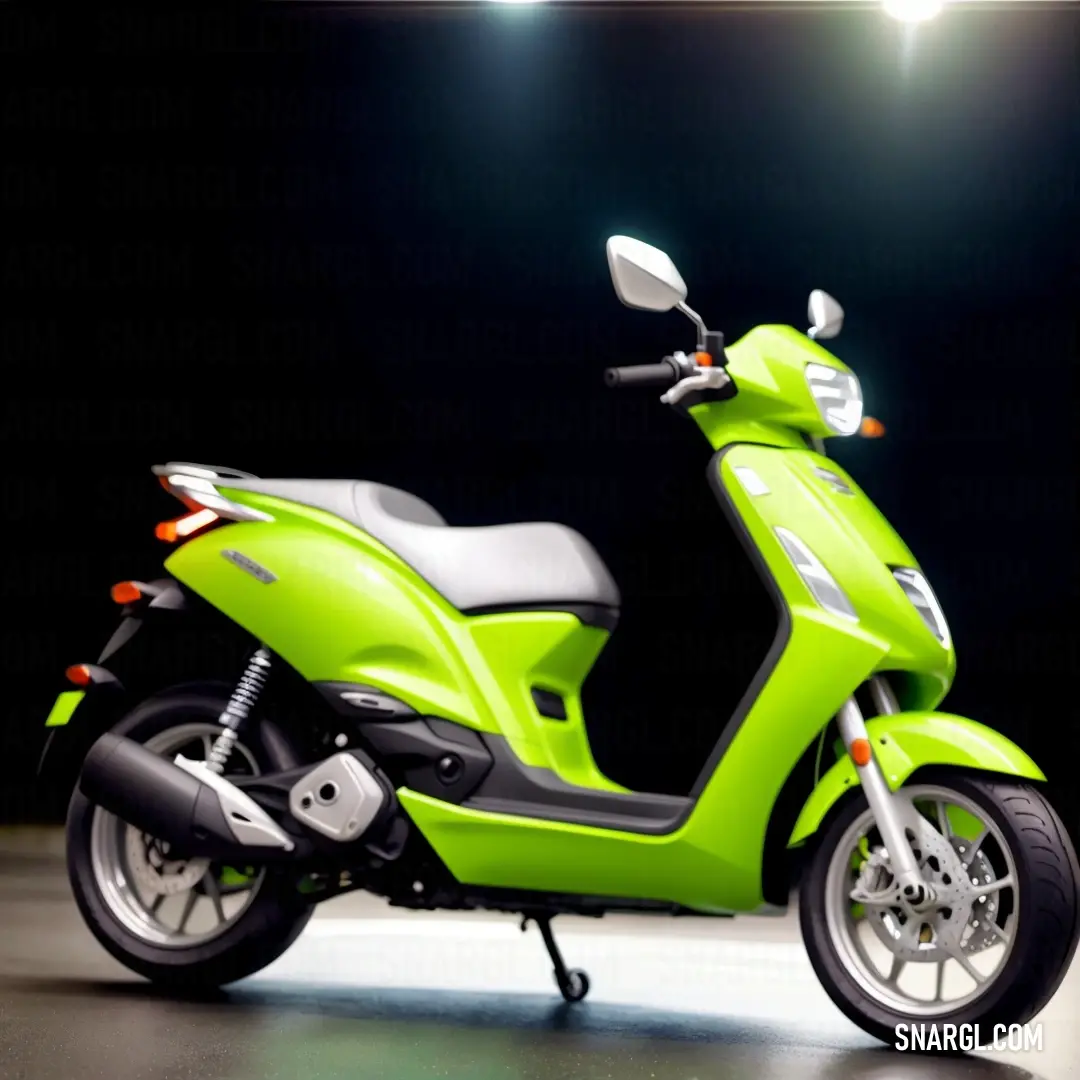 Green scooter is parked in a dark room with a spotlight on the wall behind it and a black background