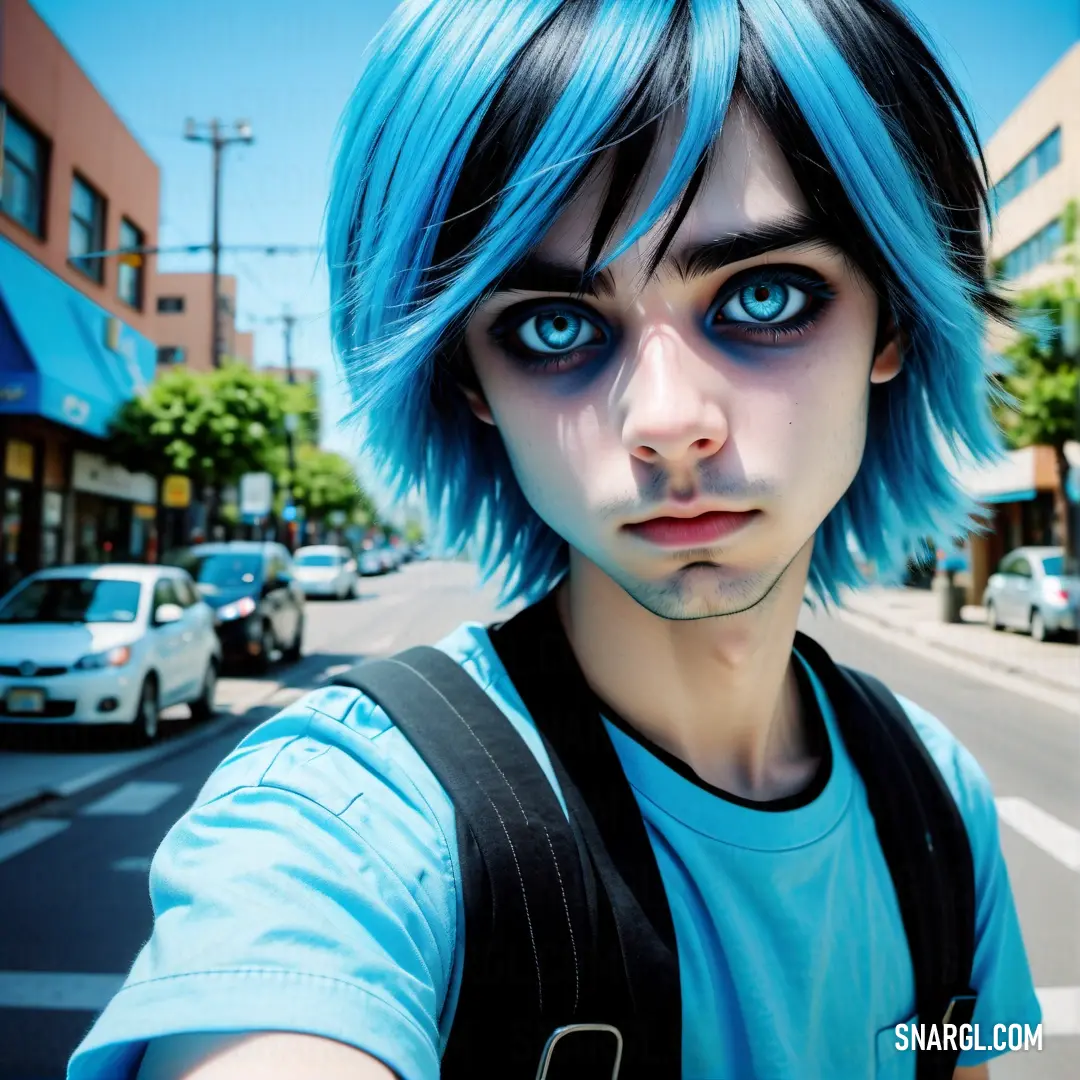 Man with blue hair and blue eyes is taking a selfie on a street corner with a car