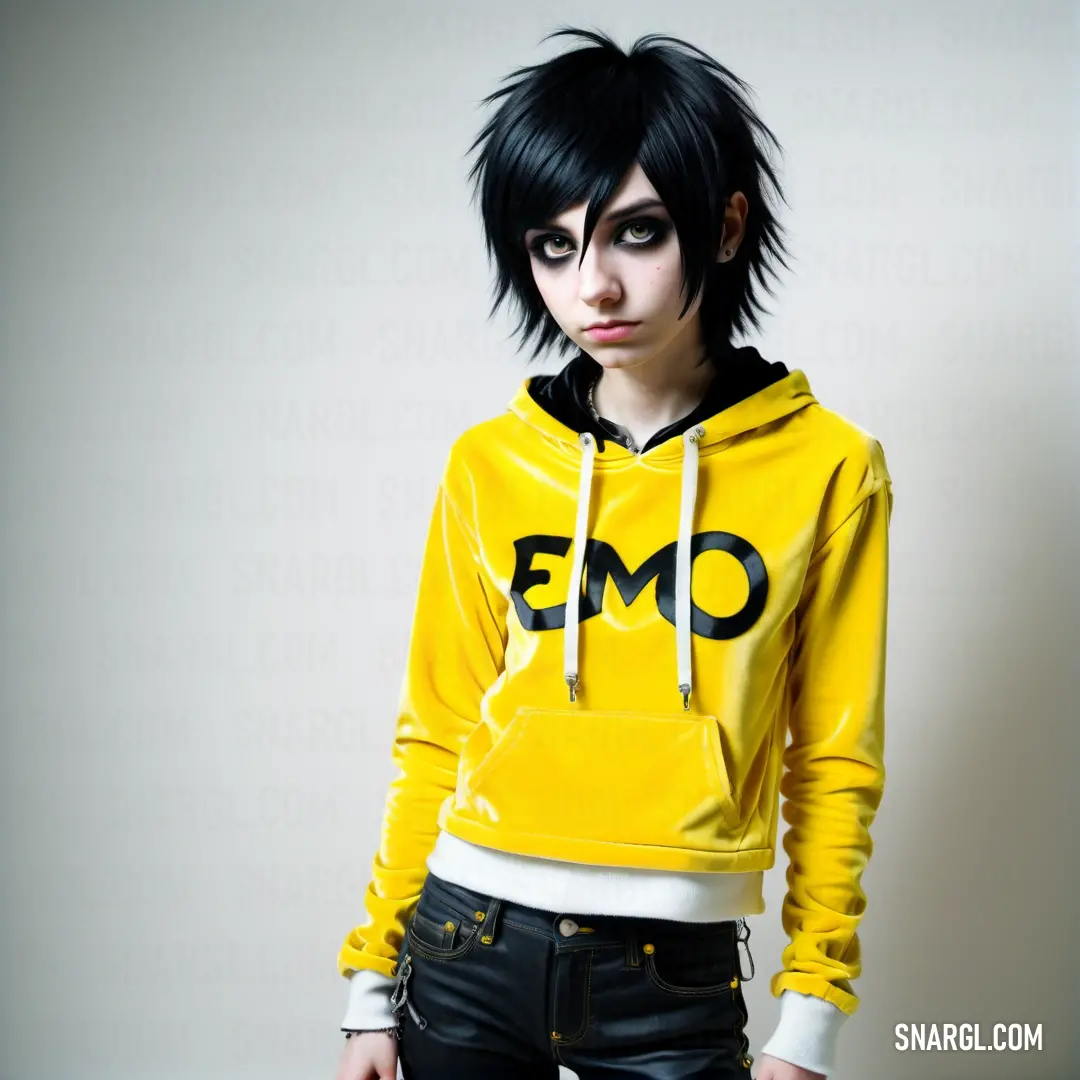 Woman with black hair wearing a yellow hoodie with emo written on it