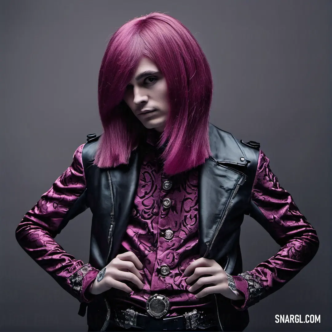 Woman with pink hair and a leather jacket on posing for a picture