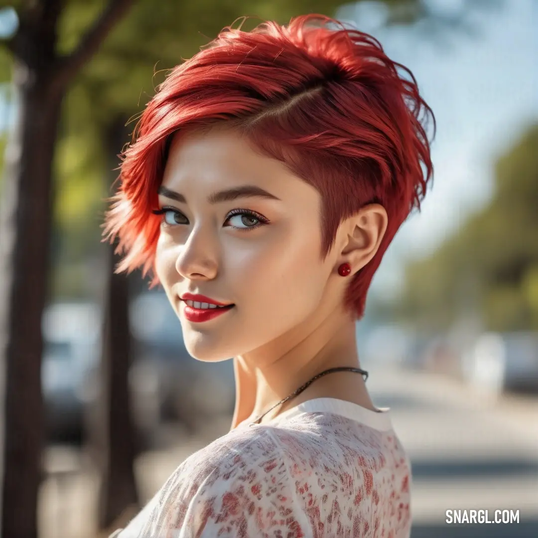 Woman with red hair and a white top is posing for a picture in the street. Color Falu red.