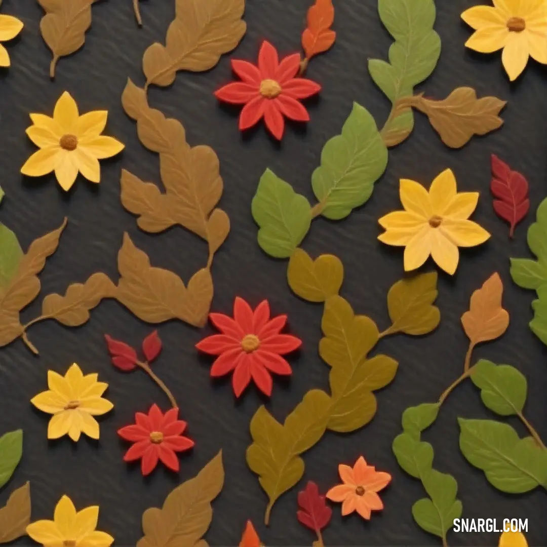 Bunch of fake flowers and leaves on a table top with a black background with a black border around them