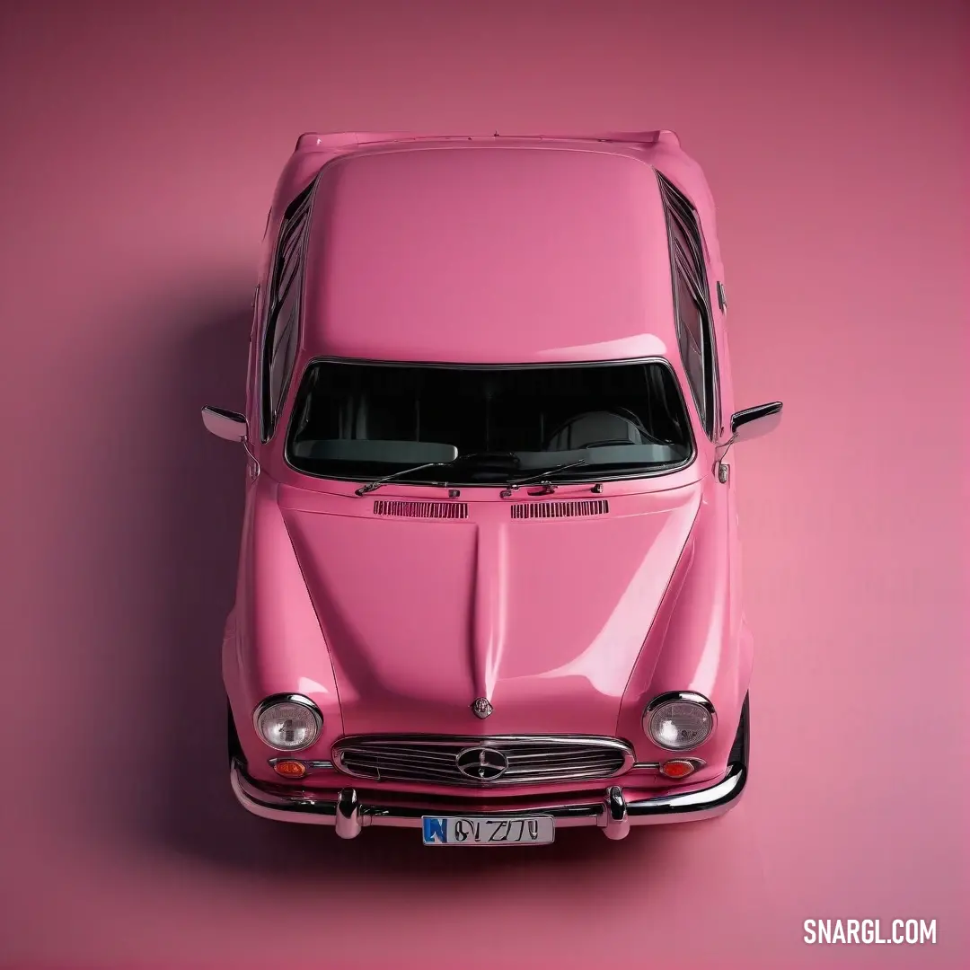 Pink car is shown in a pink background. Example of CMYK 0,44,32,1 color.