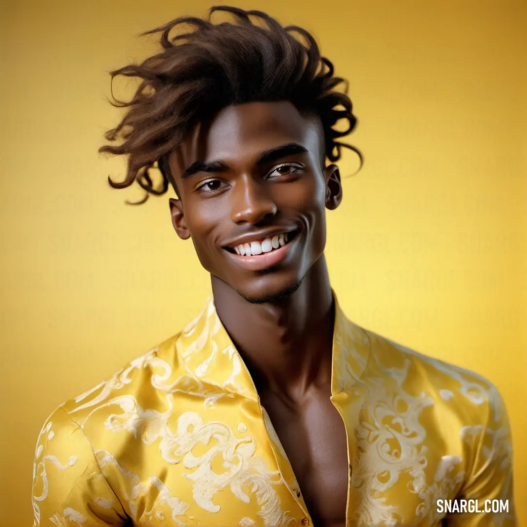 Man with a yellow shirt and a smile on his face and hair in the wind. Color CMYK 0,8,45,7.