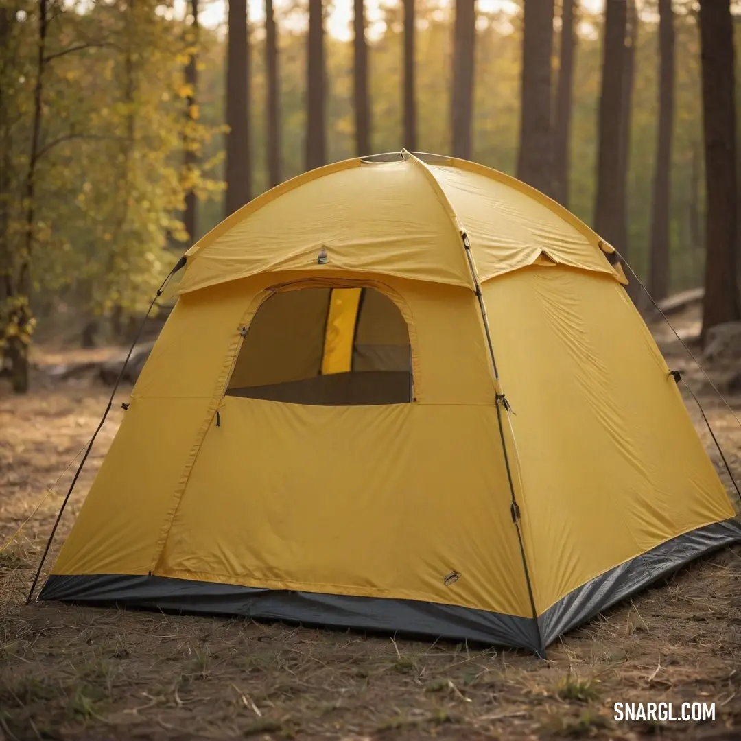 A vibrant yellow and gray camping tent nestled in a lush green forest, surrounded by towering trees that provide shelter and comfort, showcasing the perfect retreat for outdoor lovers seeking solace in nature's embrace.