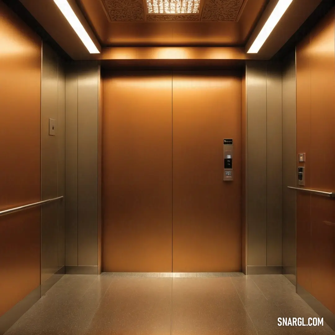 A modern elevator glistens with polished surfaces, illuminated by an elegant overhead light that casts a warm glow, creating an inviting ambiance. The stylish design reflects a contemporary approach to functional architecture.