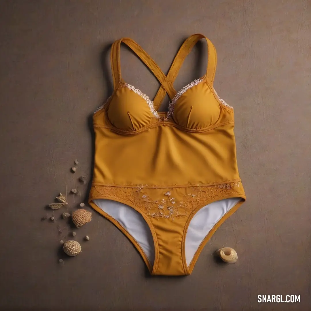 Yellow bikini with white lace on the bottom and a yellow bra with white lace on the bottom and a brown background