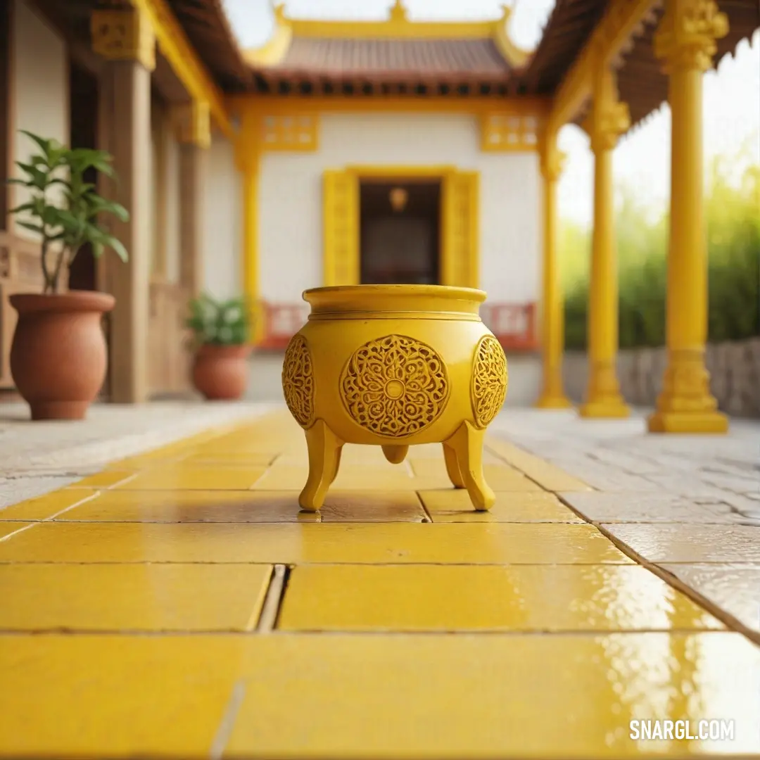 A vibrant yellow pot sits on a tiled floor in front of a grand building with yellow pillars, casting a cheerful glow across the scene. The combination of yellow tones creates a bold, sunny aesthetic.