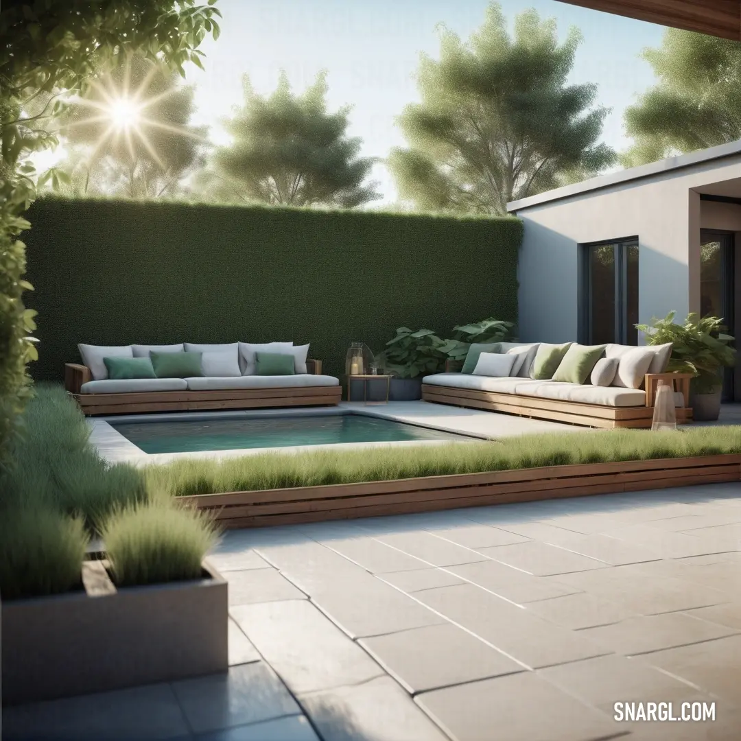 Patio with a couch and a pool in the middle of it with a green wall behind it and a wooden bench with pillows on it