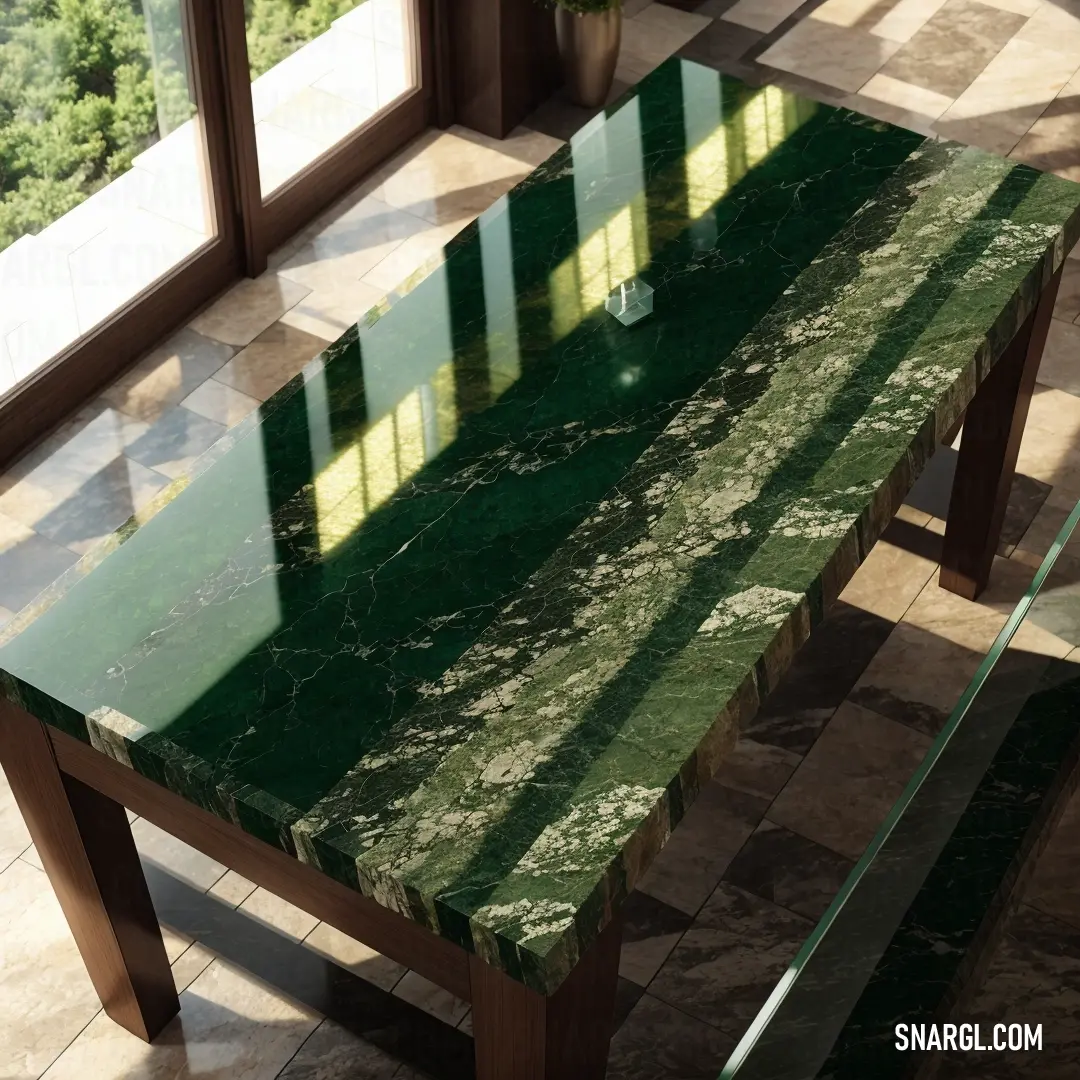 Green marble table with a glass top and a vase of flowers on the table next to it on a tiled floor. Example of Green color.