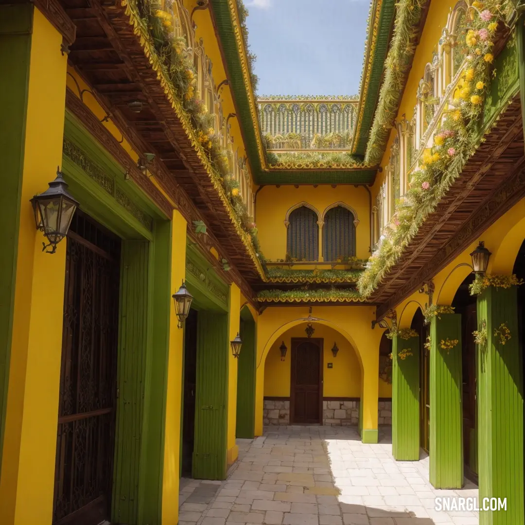 Courtyard with a green door and yellow walls and a green door and a light fixture on the side of the building