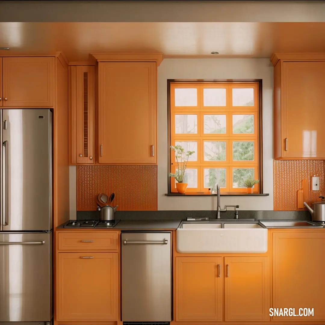Grullo color example: Kitchen with orange cabinets and a silver refrigerator and sink and a window with a pane of fruit on it