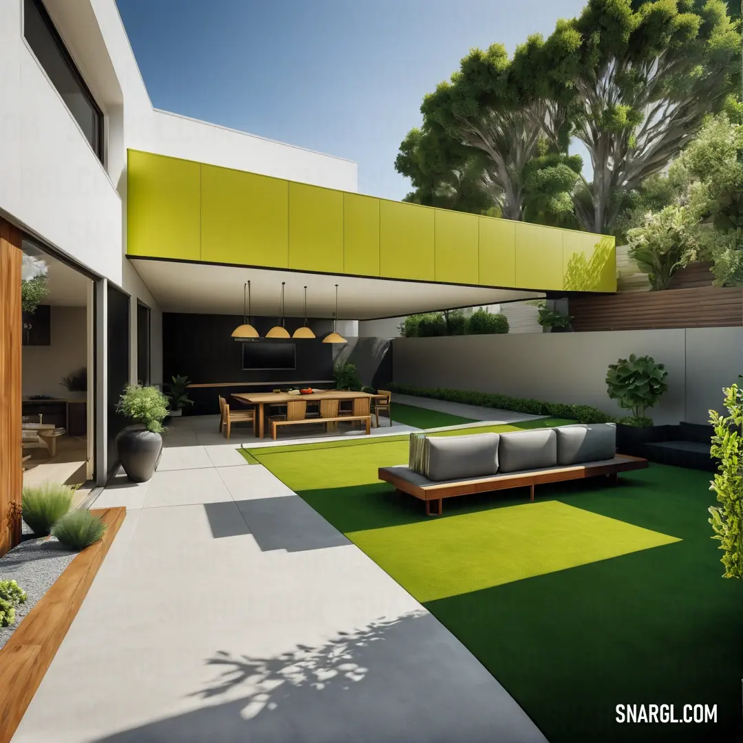 Heart Gold color. Modern house with a green roof and a green lawn area with a couch and table and chairs