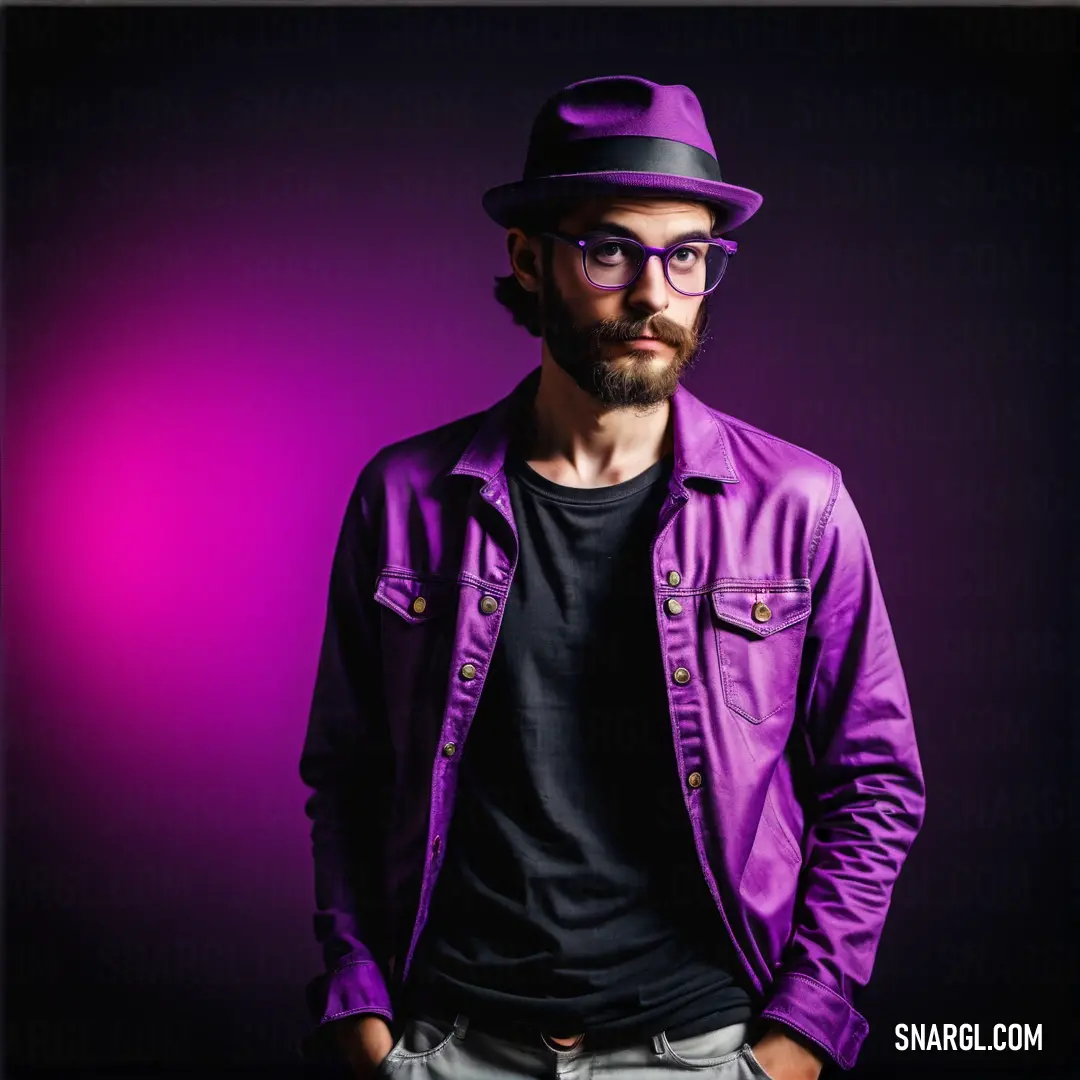 Man with a beard wearing a purple jacket and hat and glasses on a purple background