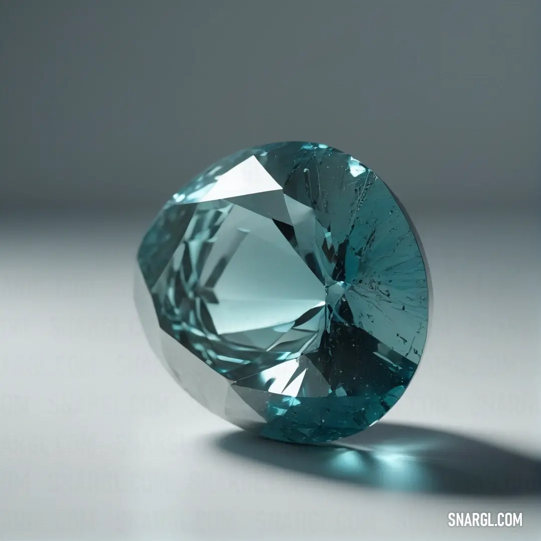 A blue diamond resting on a white surface, casting a subtle shadow. The smooth surface highlights the honeydew color around the edges, enhancing the intricate facets of the gem.