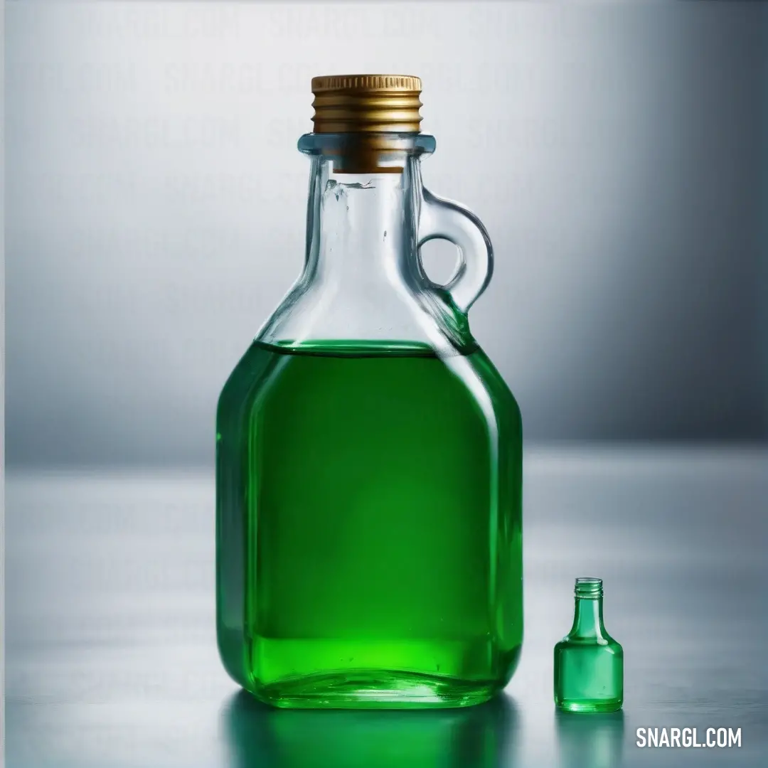 India green color. Bottle of green liquid next to a bottle of green liquid on a table
