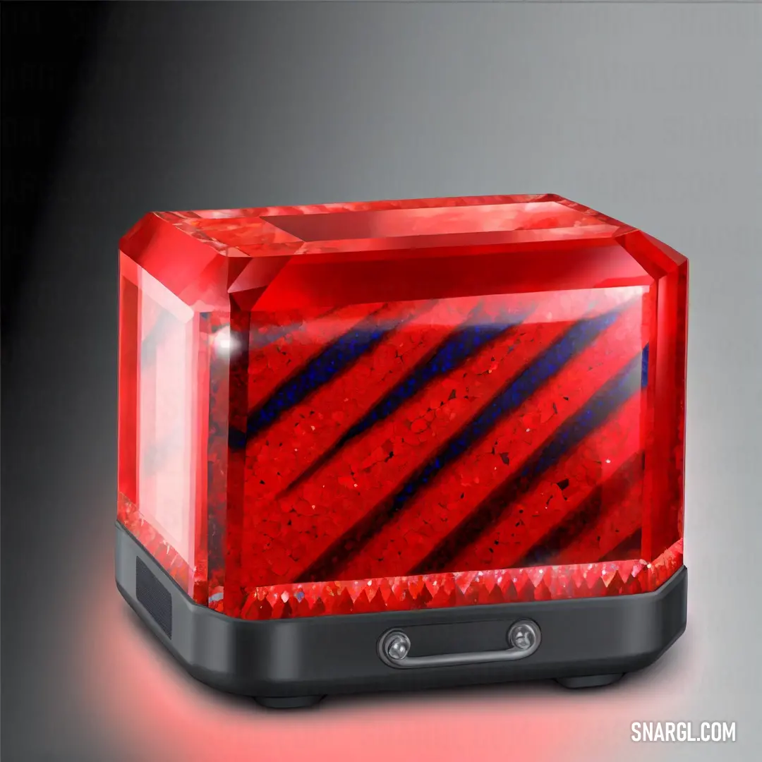 Red and black object with a red light on it's side and a black base with a red light on it