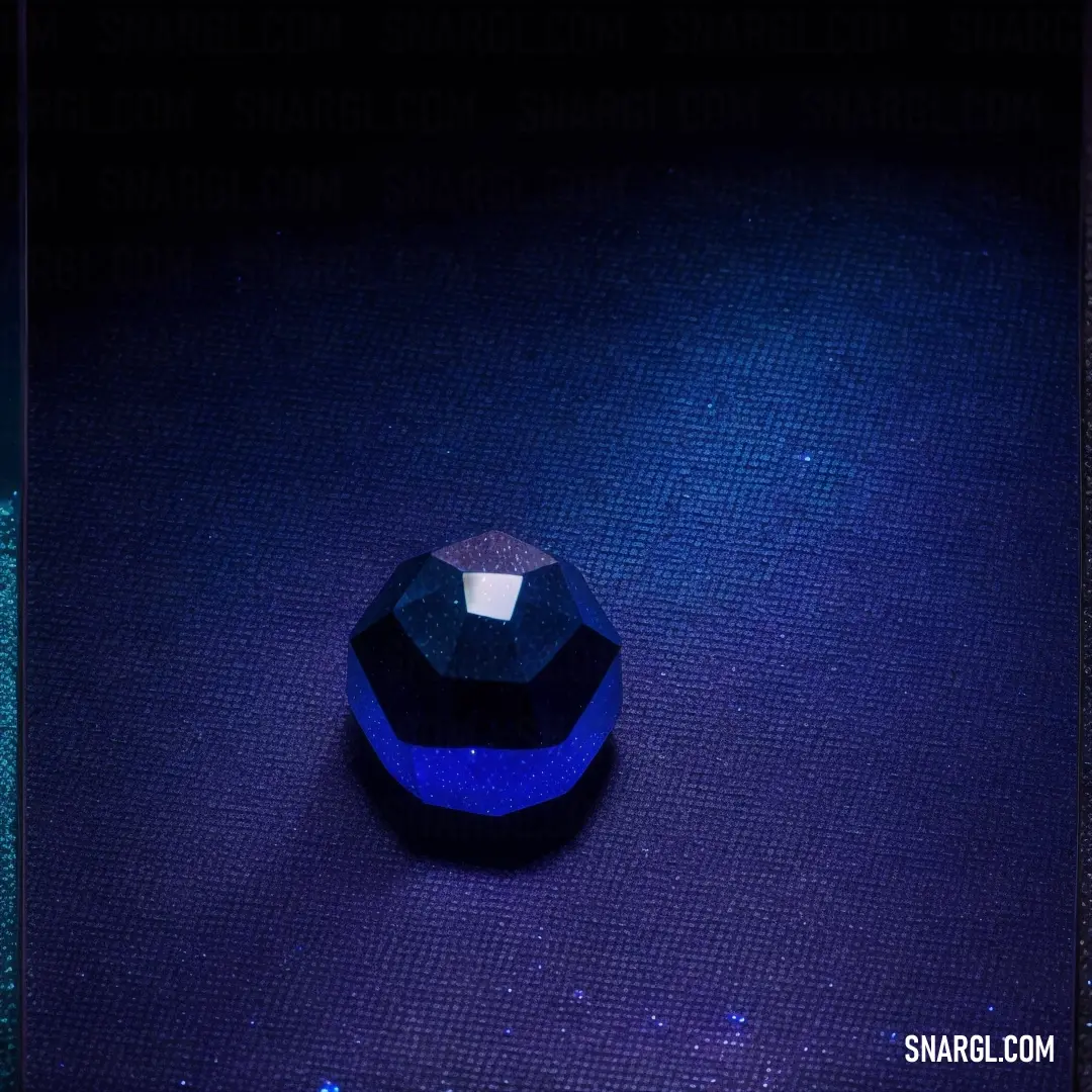 Klein Blue color. Blue diamond on a purple surface with a blue background