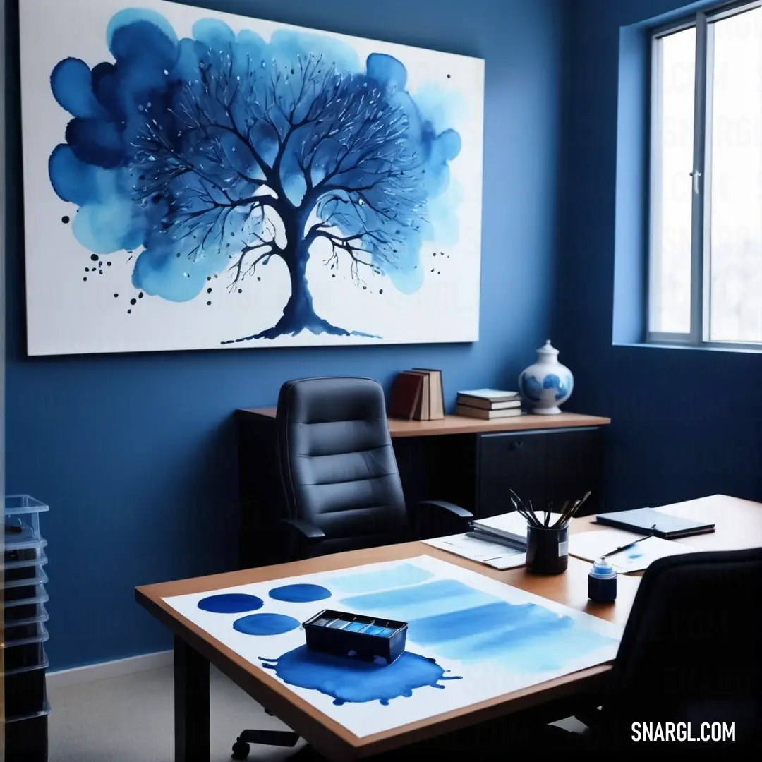 Klein Blue color. Painting on a wall in an office with a desk and chair in front of it