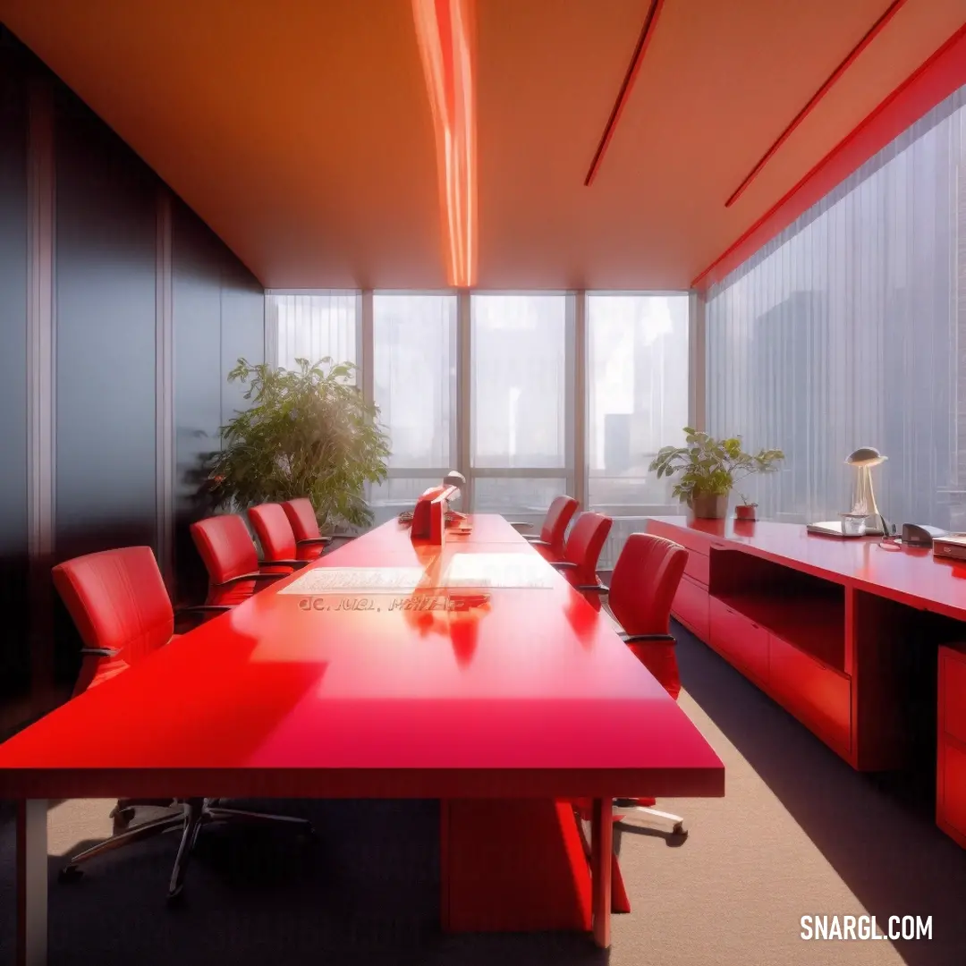 Red table in a room with a red chair and a plant in the corner of the room