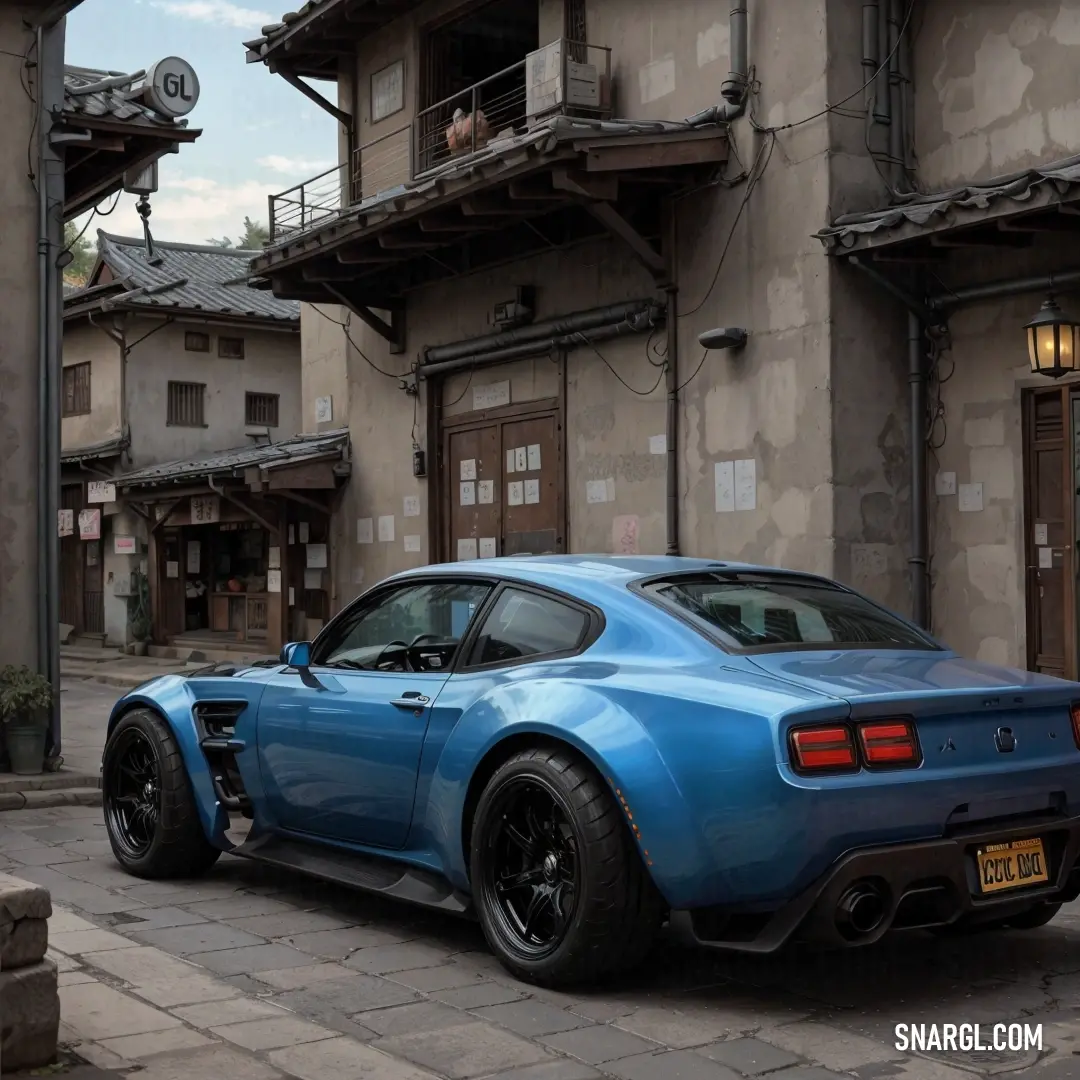 Blue sports car parked in front of a building with a balcony on the roof of it's roof