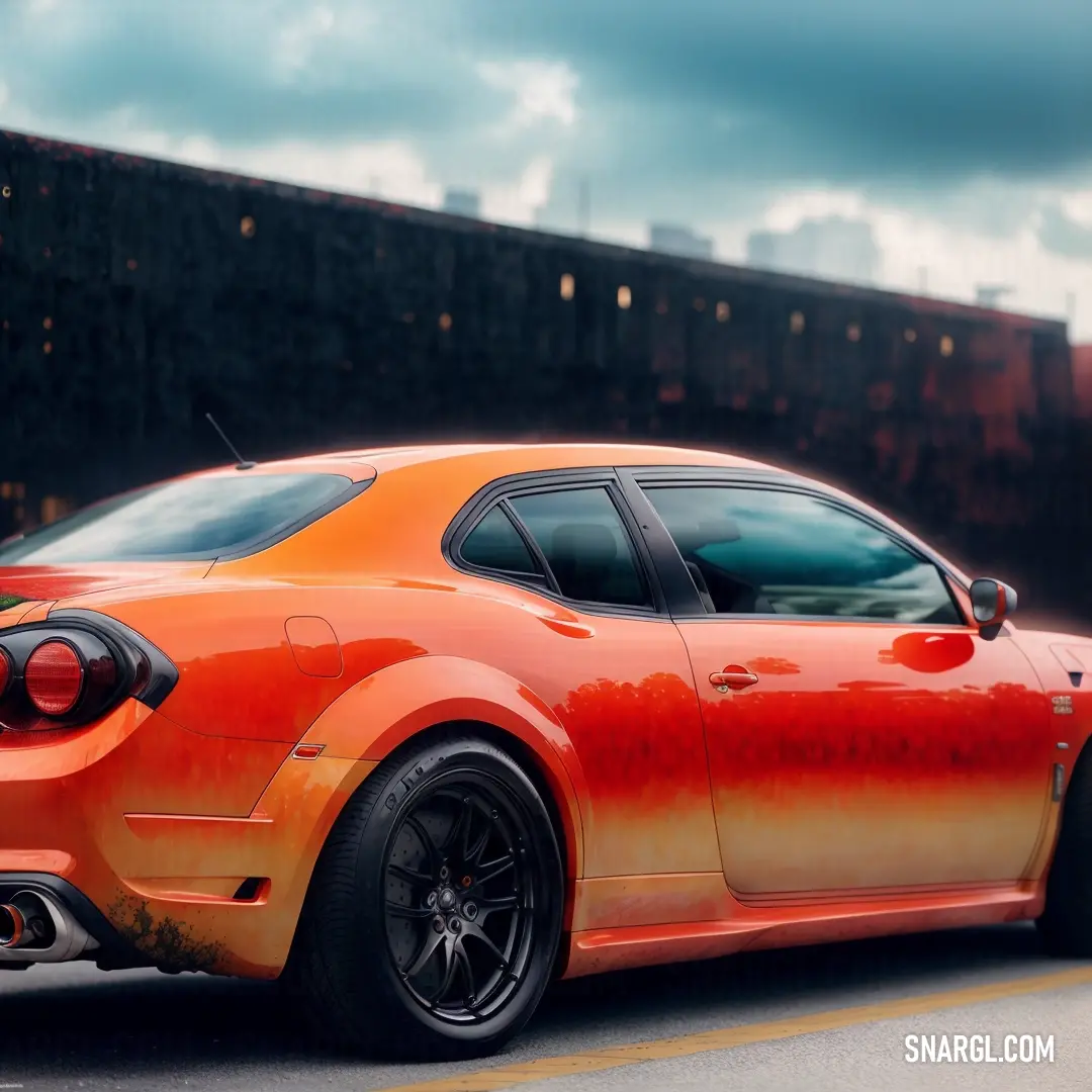 Car with orange paint on it parked in a parking lot next to a building with a sky background. Example of Lava color.