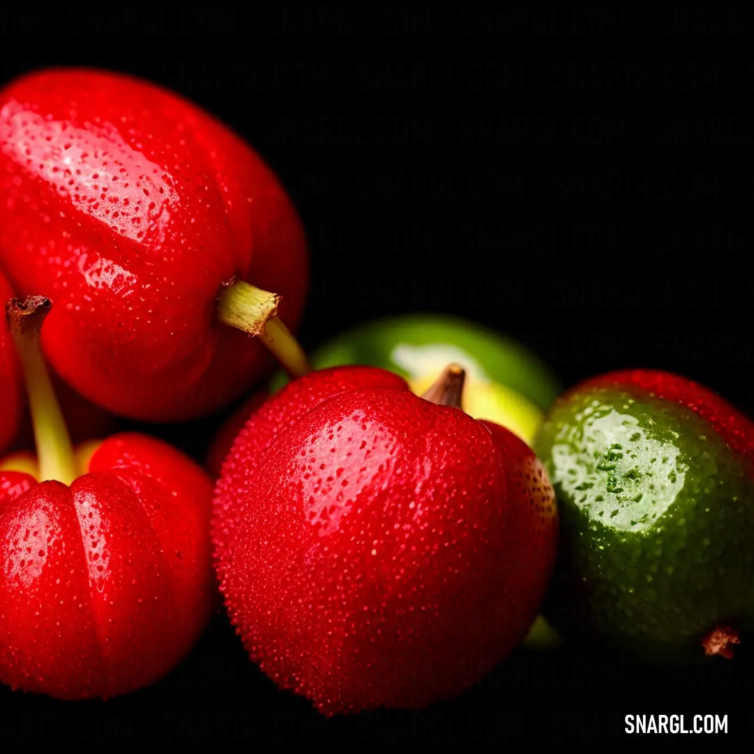 Group of fruit on top of each other on a table with water droplets on them and a green apple. Example of RGB 207,16,32 color.