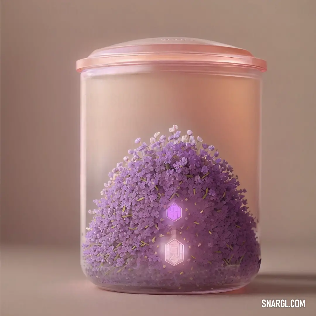 Jar with a purple flower inside of it on a table next to a wall and a light bulb