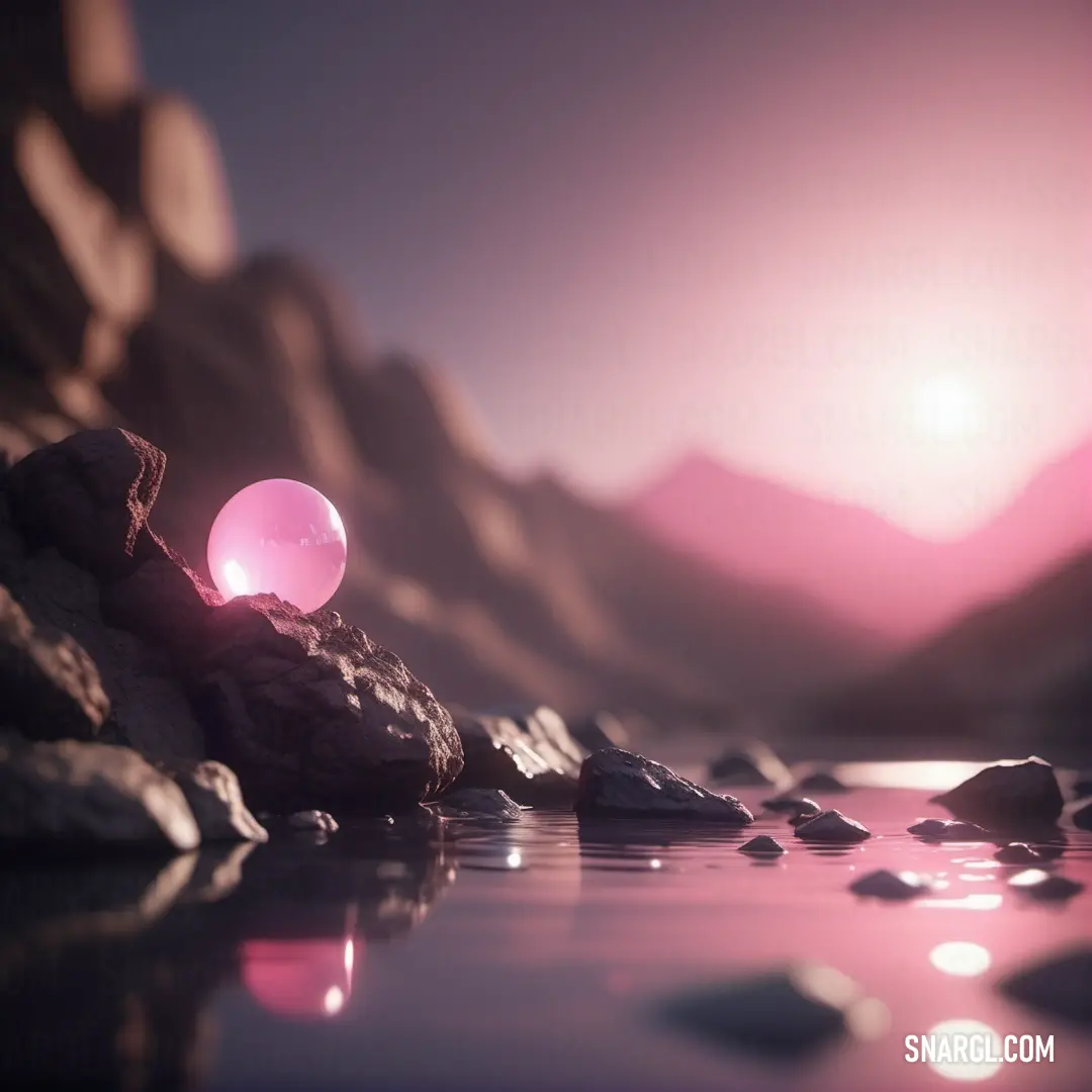 Pink ball on top of a rock next to a body of water with rocks. Example of #FBA0E3 color.