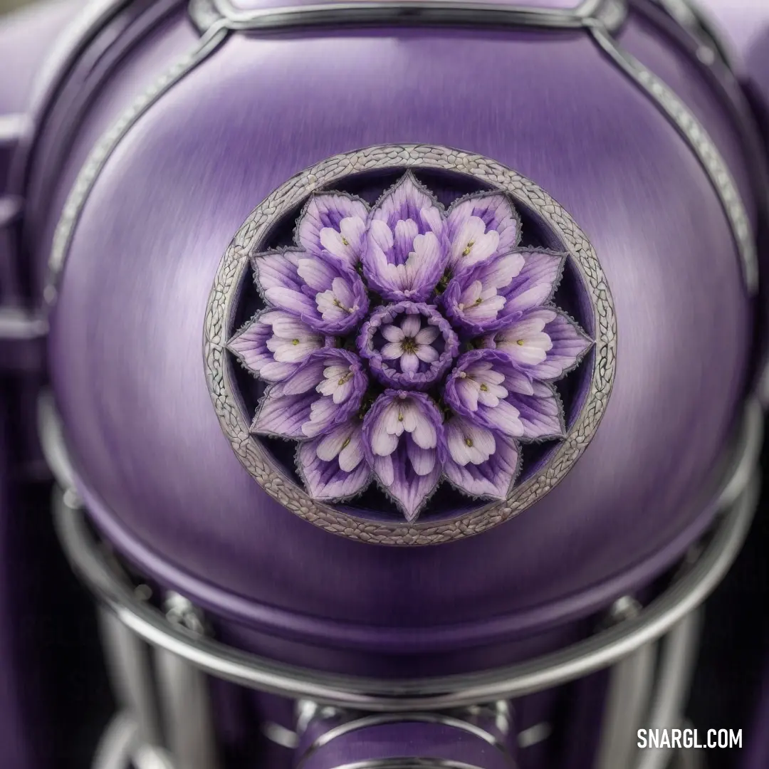 Purple motorcycle with a flower on the front wheel and a silver frame around the center wheel