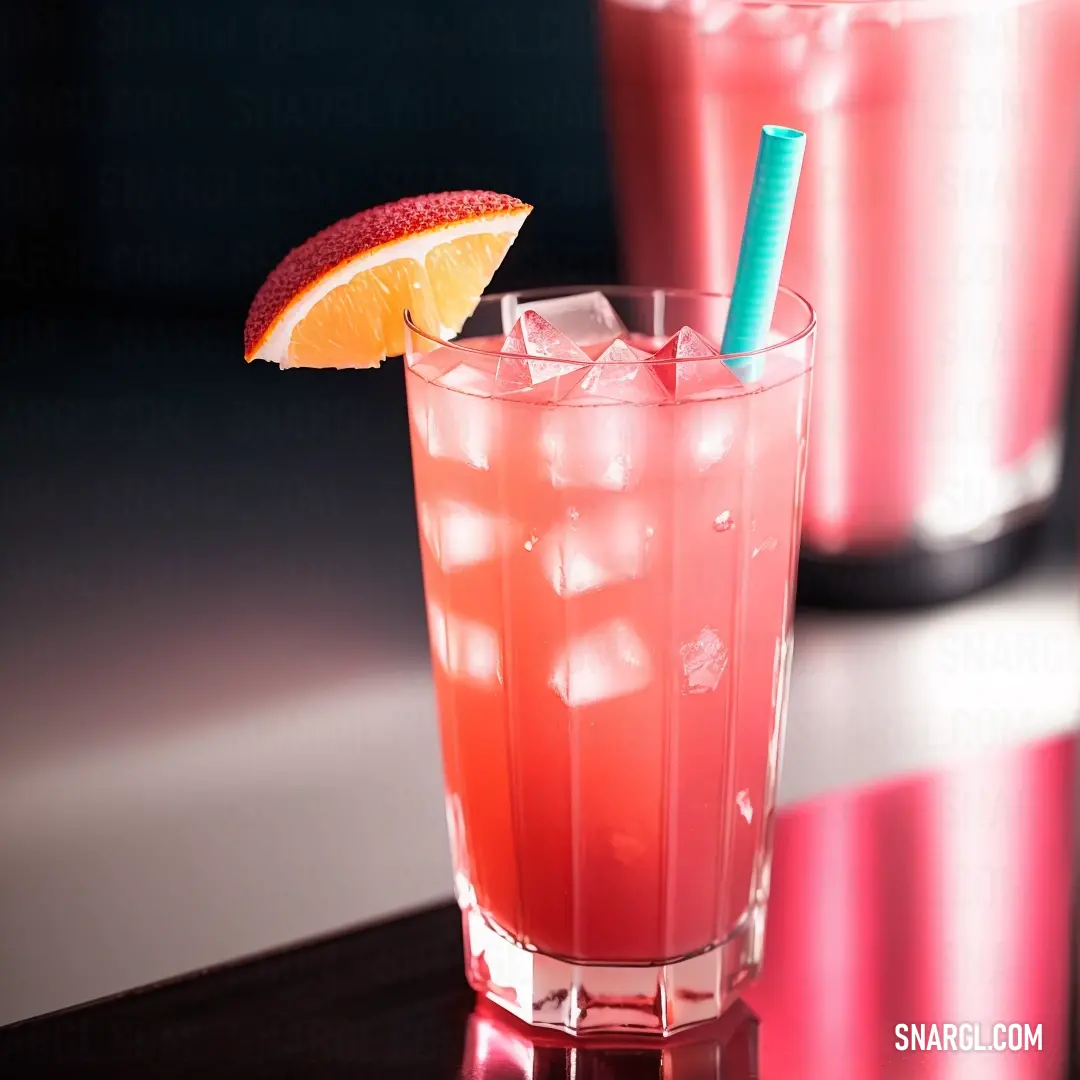 Pink drink with a blue straw and a slice of orange on the rim