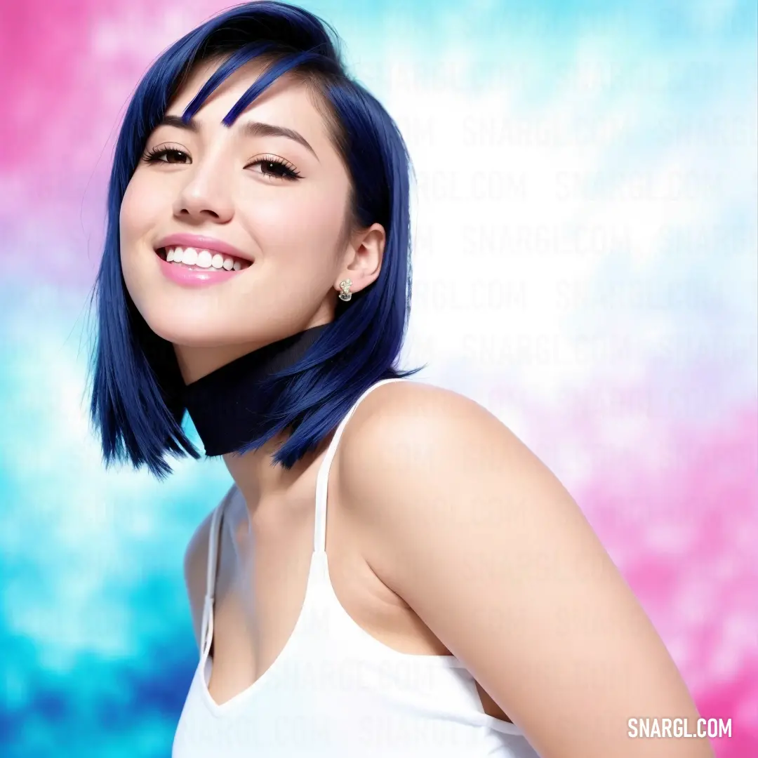Woman with blue hair and a white tank top smiling at the camera with a pink