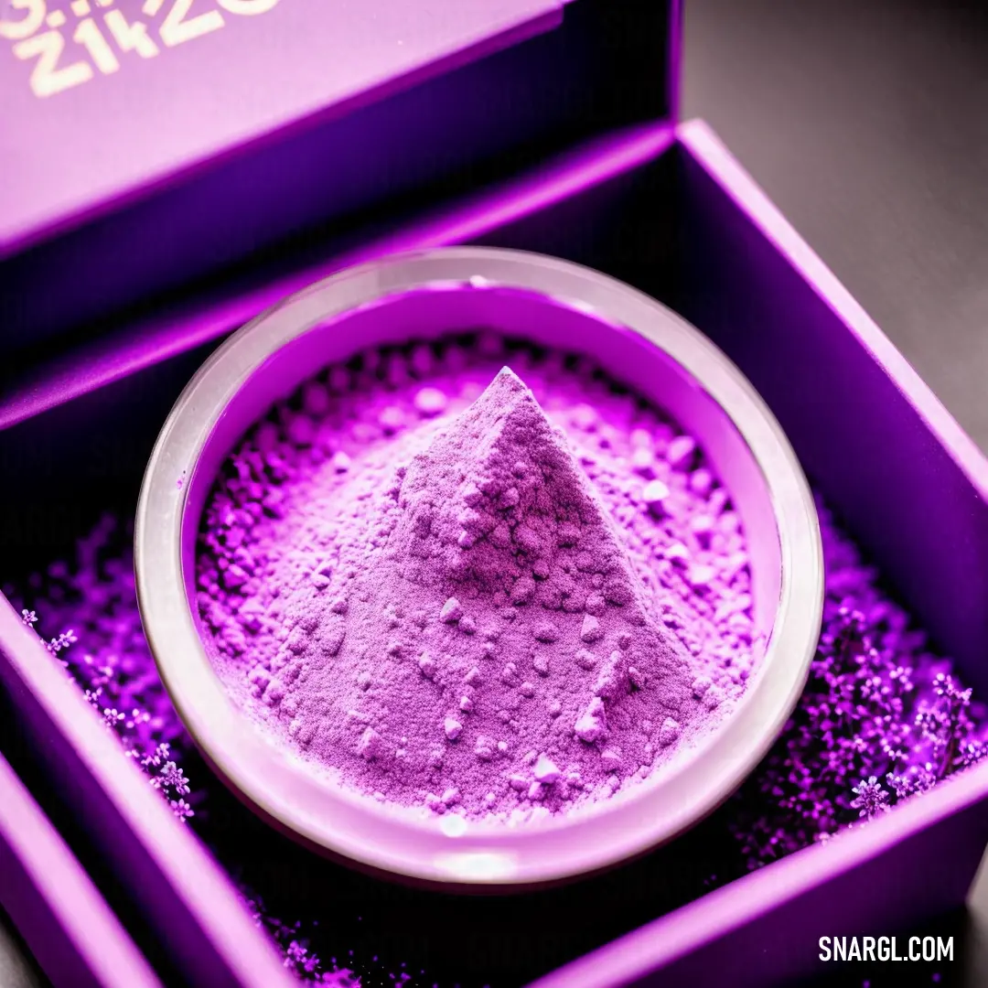 Purple powder in a purple box on a table with a purple background and a purple box