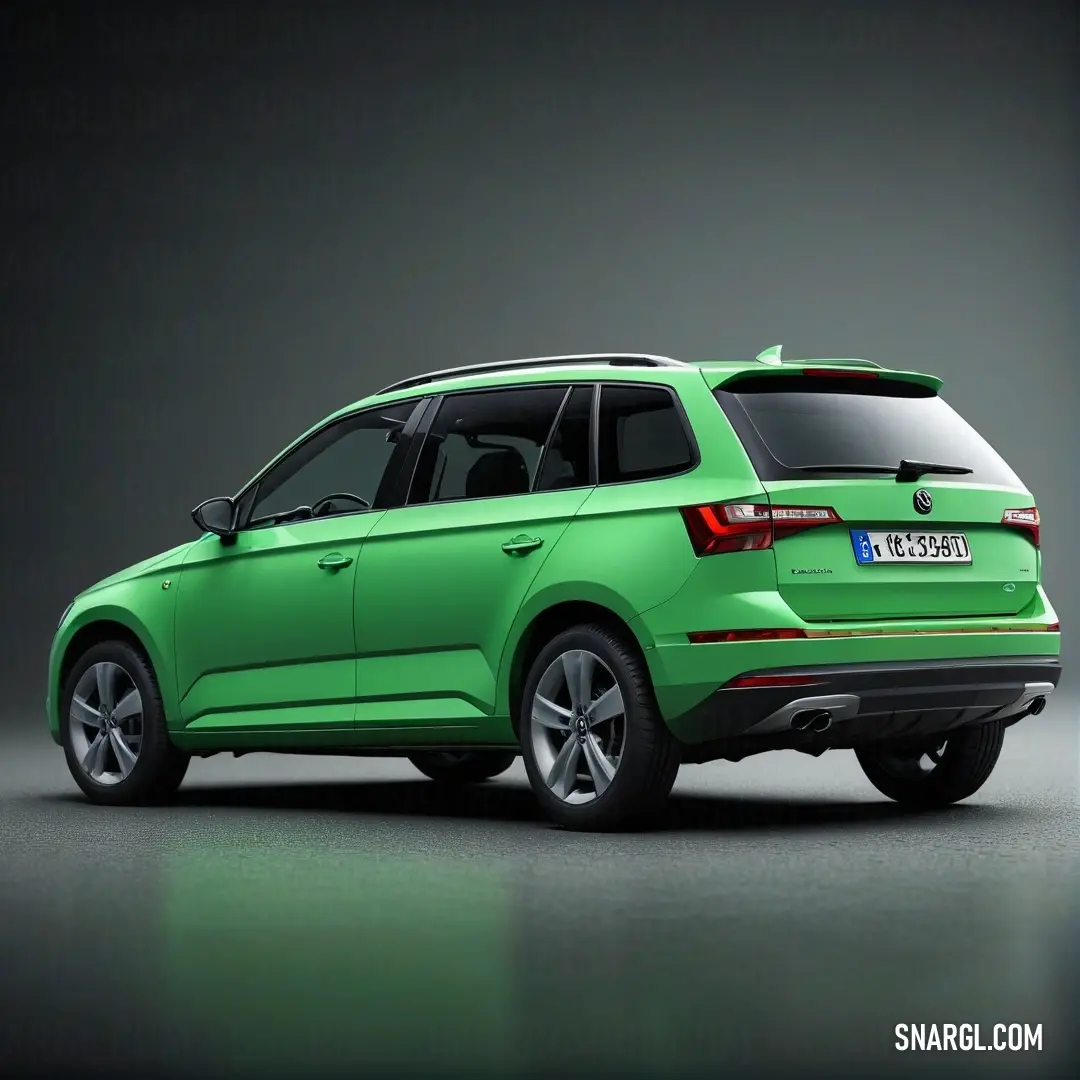 Green volkswagen suv parked in a dark room with a black background. Color CMYK 39,0,39,7.