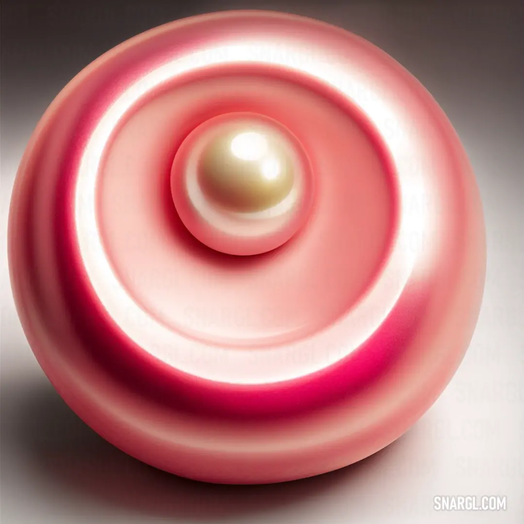 Pink object with a white ball in the center of it