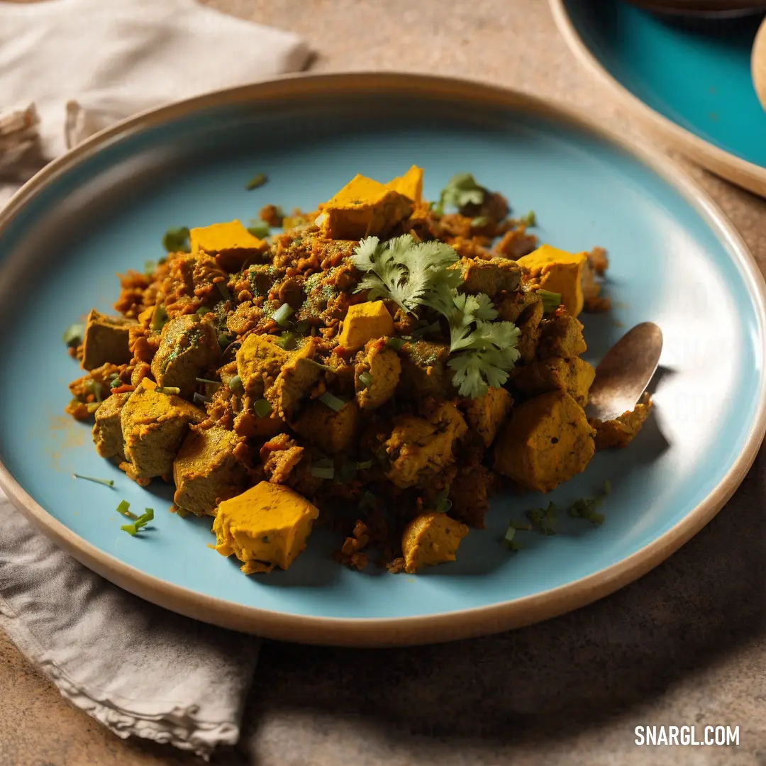 A cozy plate of comforting food, with a spoon resting beside a soft napkin on a wooden table. The rich color of the food is complemented by the light hues of the surrounding elements.