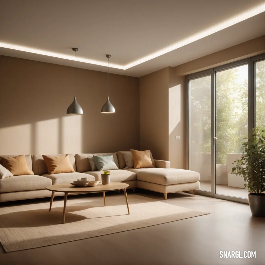Light taupe color example: Living room with a couch and a table in it with a large window overlooking the trees outside of the room