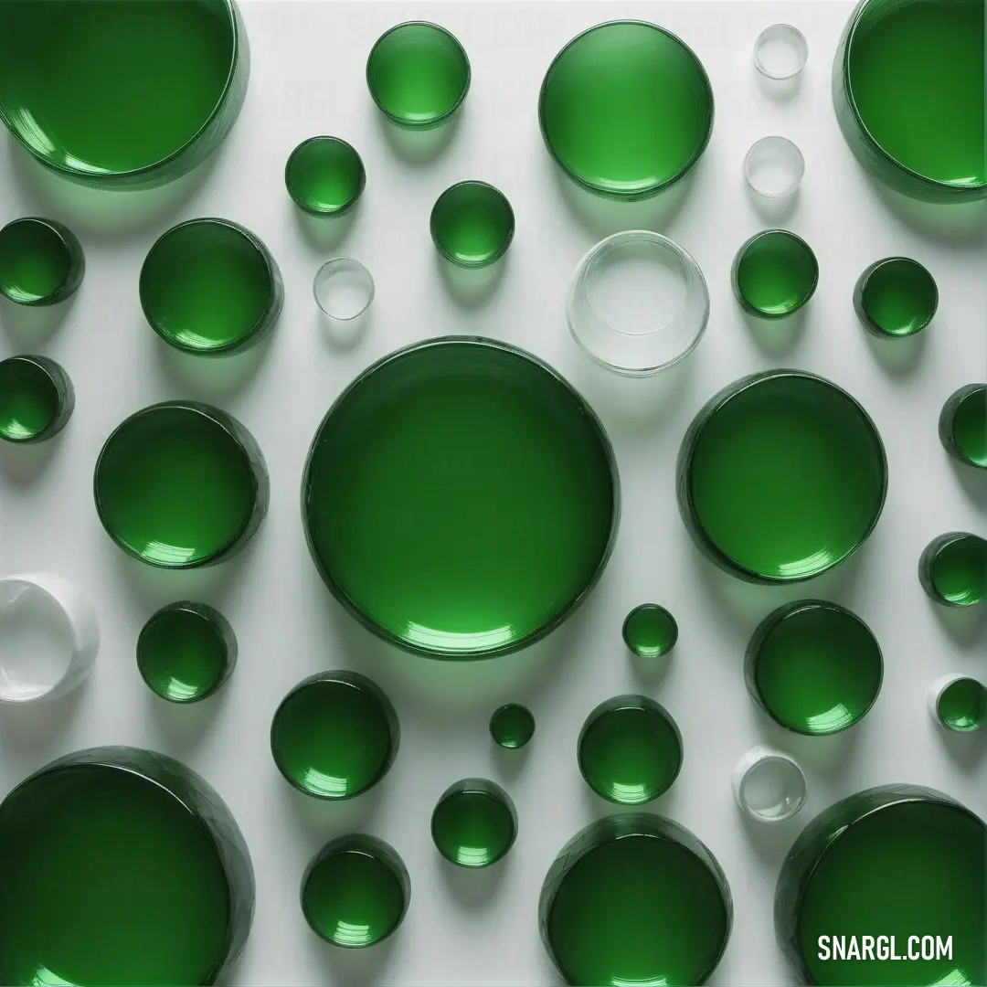 Group of green and white circles and bubbles on a white surface. Color Lincoln green.
