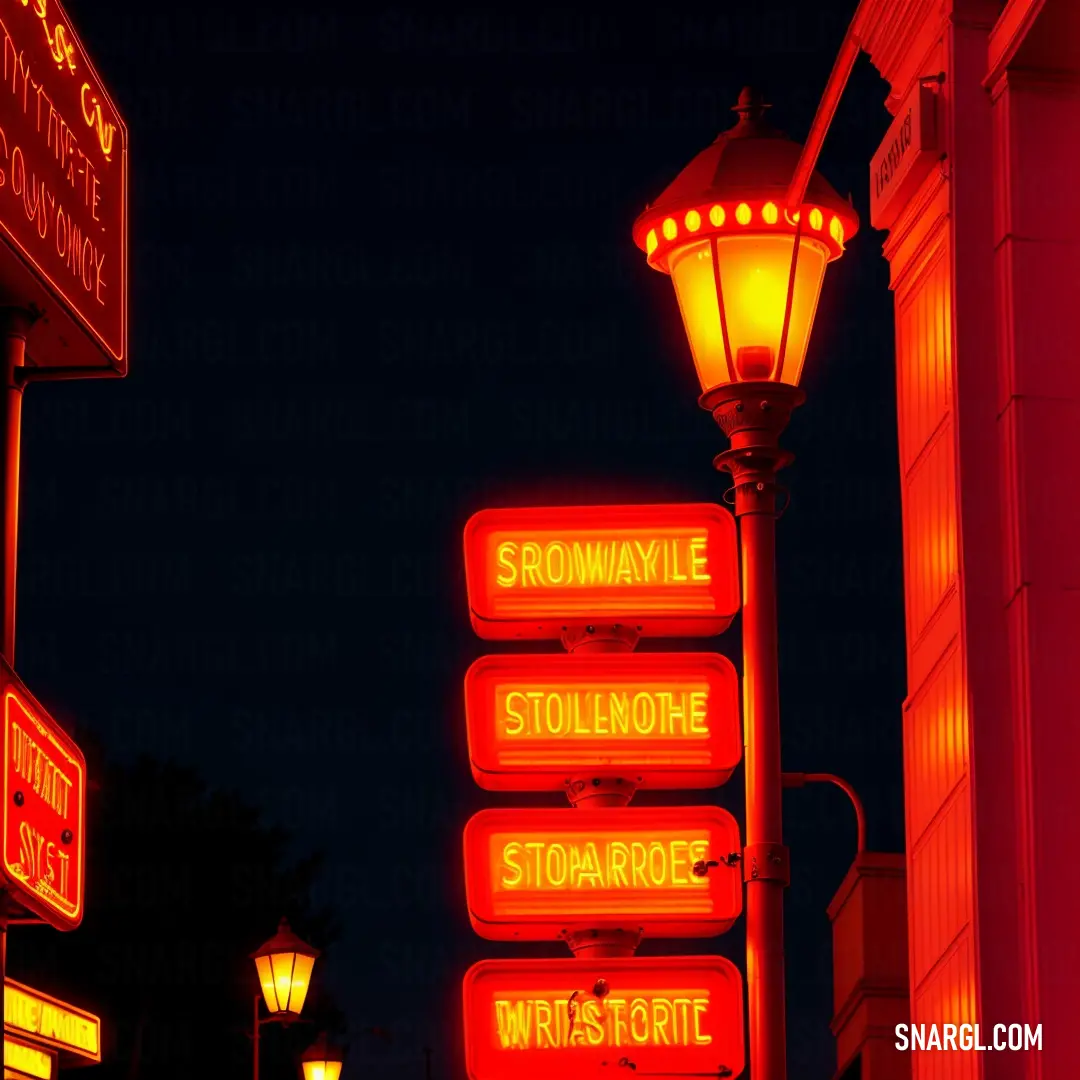 Street sign with a lamp post in the background at night time with street lights on the side of the street