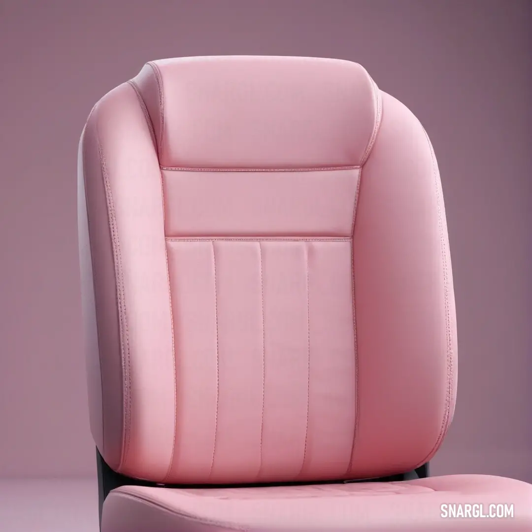 Pink leather chair with a foot rest on a pink background. Color CMYK 0,36,29,6.