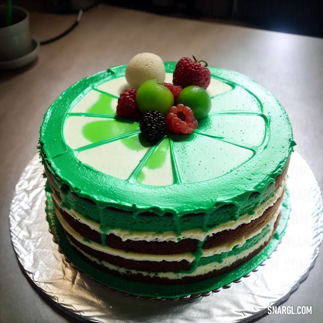 Cake with green frosting and fruit on top of it on a plate on a table with a cup of coffee. Example of RGB 102,221,170 color.
