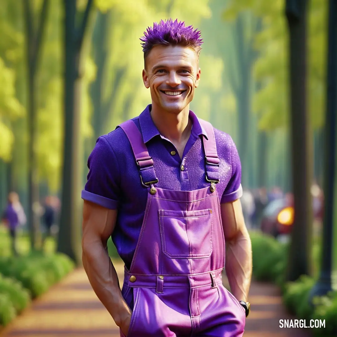 Man with a mohawk is wearing purple overalls and smiling at the camera while standing in a park. Color CMYK 12,60,0,17.