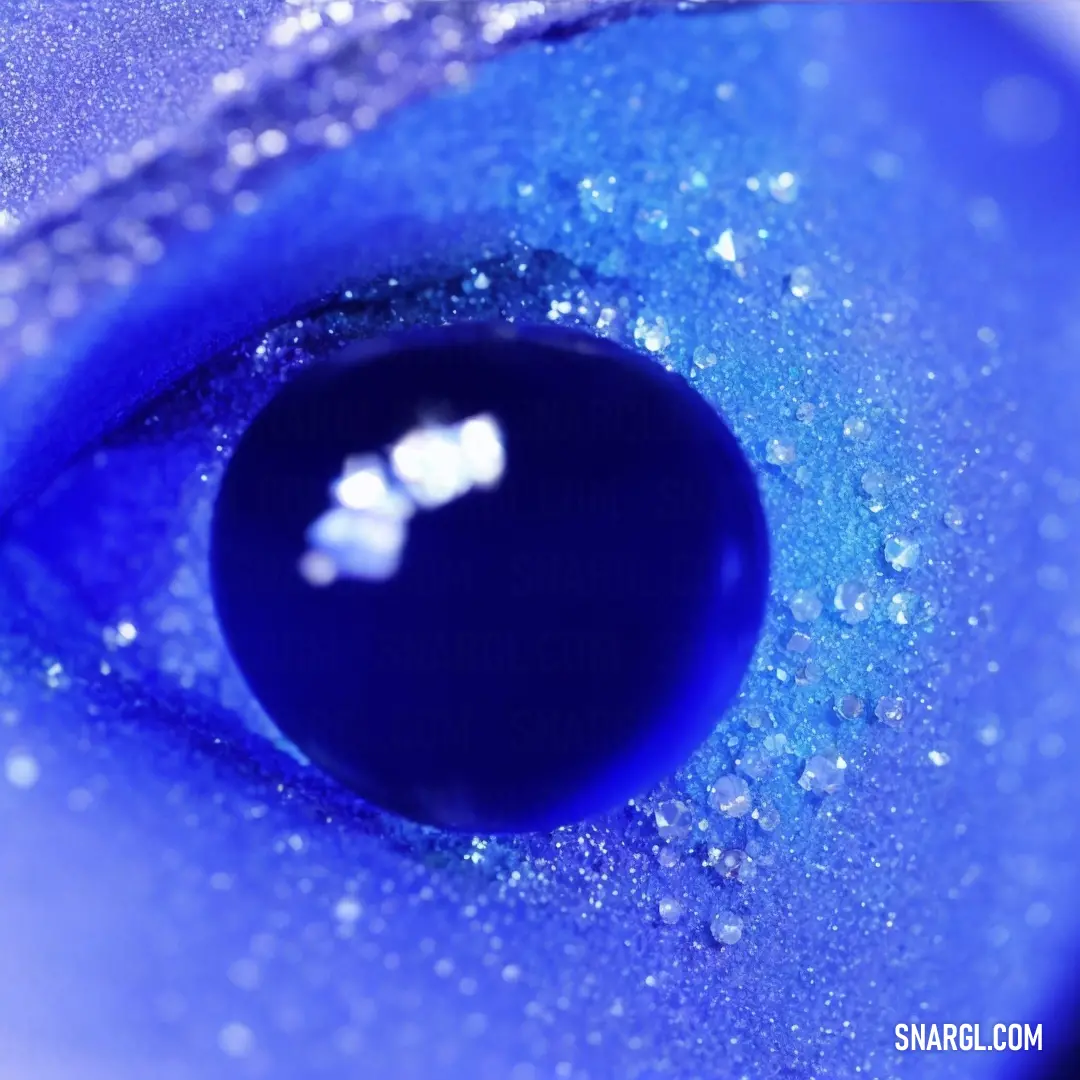Close up of a blue eye with a white flower on it's irise
