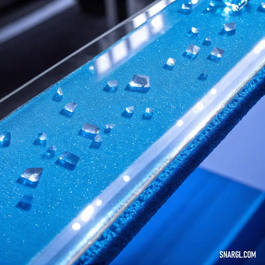 Blue table with a lot of diamonds on it and a blue table top