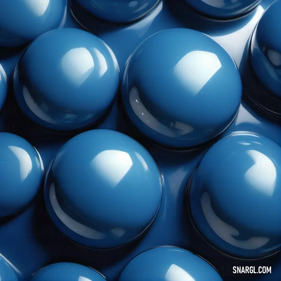 Close up of a bunch of blue balls in a pile together on a table top or floor or surface. Example of RGB 0,84,180 color.